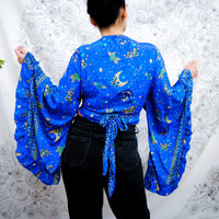 Celestial Flare Sleeve Wrap Top