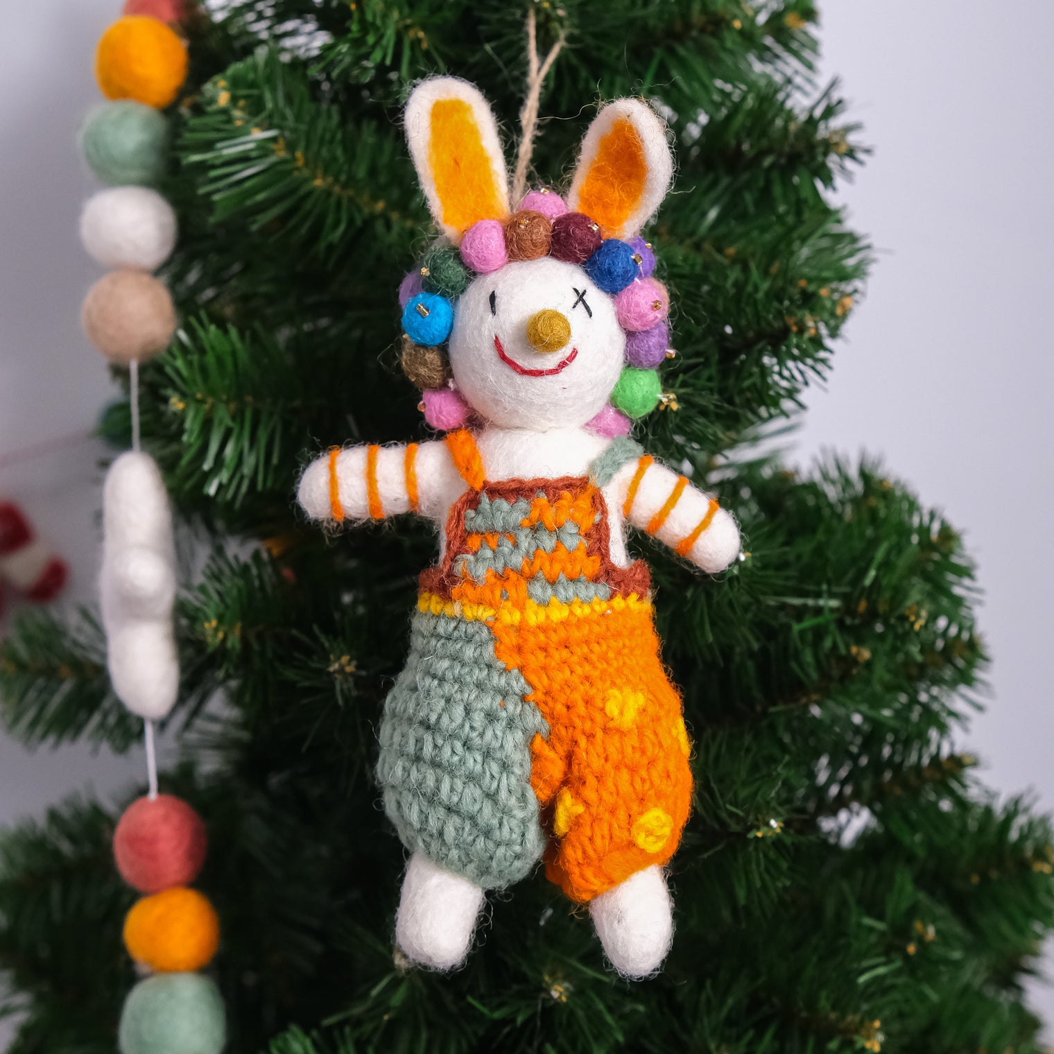 Needle Felted Bunny with Pom Pom Crown and Knitted Overalls